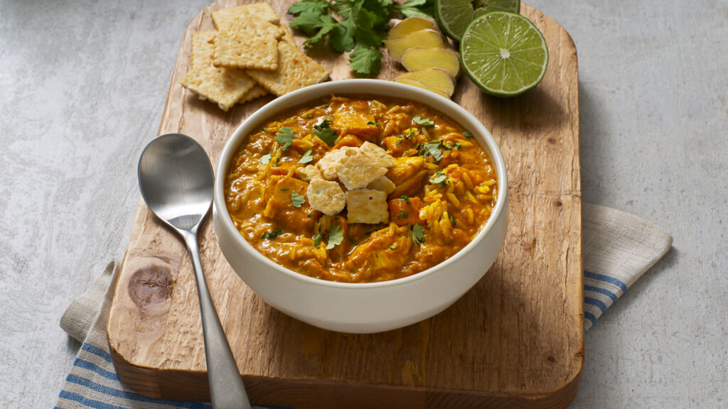 fish-chowder-with-cod-coconut-milk-jasmine-rice-and-sweet-potatoes-topped-with-oyster-crackers
